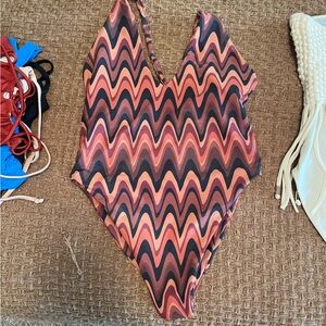 Skatie one piece suit size medium